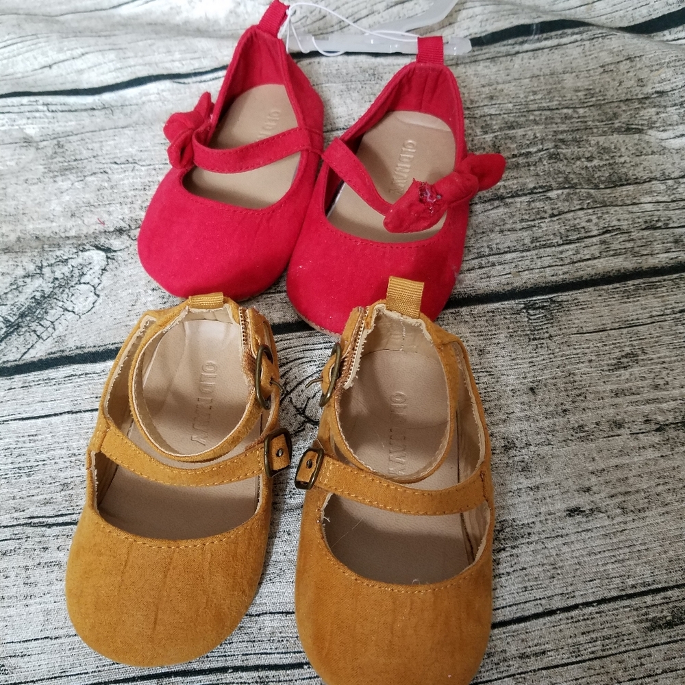 Old Navy Size 6 - 12 Months.the red shoe trim is in poor condition